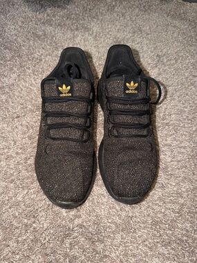 adidas women’s Black Knit Sneakers with Gold shimmer